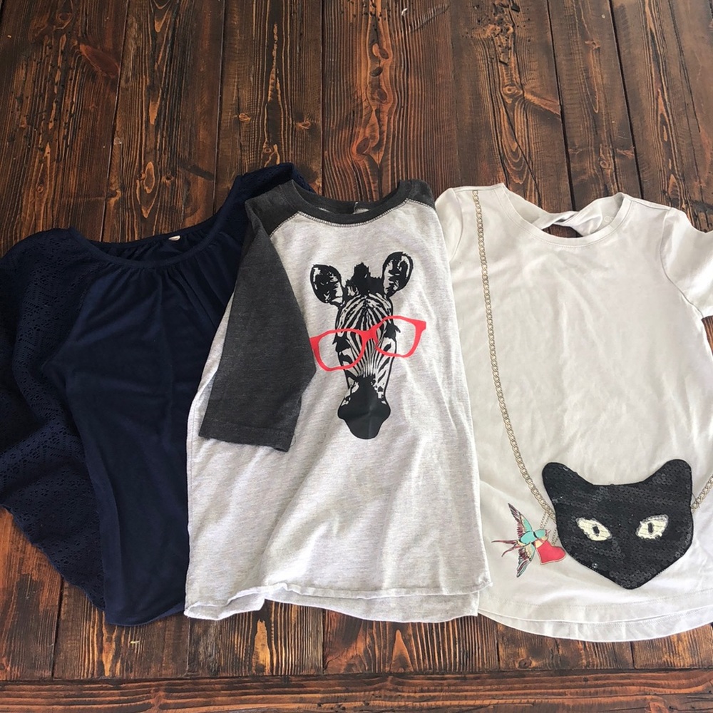 Bundle of girls shirts - Size Med/8-10.
